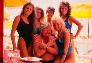 Benny Hill comedian June 1992 With girls on beach pointing fingers Benny Hill comedian June 1992 With girls on beach pointing fingers