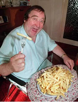 Images Dated 16th February 1996: Bernard Manning comedian with plate of McCains Less fat chips