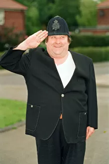 Images Dated 11th August 1992: Bernard Manning dressed in a Policemans Uniform, 11th August 1992