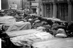 Last of the big spenders at Petticoat Lane. The scene in Petticoat Lane Last of the big spenders at Petticoat Lane. The scene in Petticoat Lane