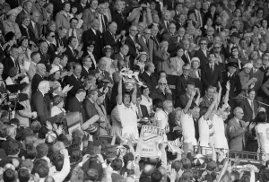 Billy Bonds holds up the FA Cup after the presentation after West Ham had beaten Arsenal Billy Bonds holds up the FA Cup after the presentation after West Ham had beaten Arsenal