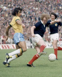 Billy Bremner in action against Wilson Piazza for Scotland in their World Cup match Billy Bremner in action against Wilson Piazza for Scotland in their World Cup match