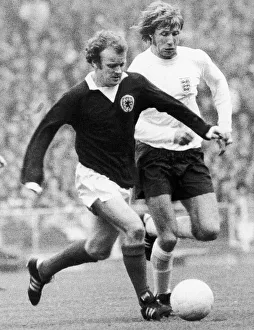 Billy Bremner and Colin Bell clash during the home international between England Billy Bremner and Colin Bell clash during the home international between England