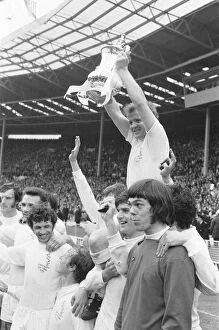 Billy Bremner Leeds United captain is lifted by his team mates with the F.A