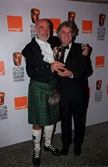 Images Dated 19th April 1998: Billy Connnolly Comedian / Actor April 98 With actor Sean Connery and his BAFTA award
