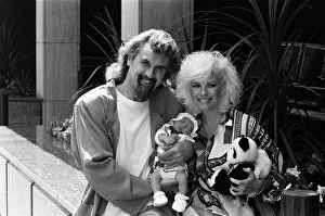 Images Dated 11th July 1986: Billy Connolly and Pamela Stephenson with their baby daughter Amy. 11th July 1986