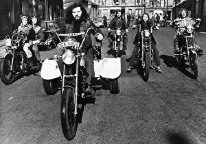 Billy Gordon rides home made tricycle in Glasgow, May 1972 Accompanied by fellow Billy Gordon rides home made tricycle in Glasgow, May 1972 Accompanied by fellow
