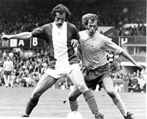 Birminghams Bob Hatton (left) tussels with Derby'