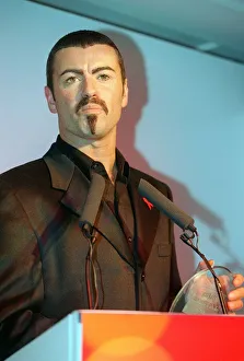 Birthdays - George MIchael George Michael the singer collects his award at Birthdays - George MIchael George Michael the singer collects his award at