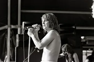 Images Dated 3rd August 1981: Black Sabbath singer Ozzy Osbourne performing on stage during a concert August 1981