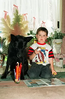 Images Dated 17th June 1993: Blackie the dog is pictured with a small boy. 17th June 1993