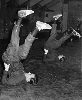 00244 Gallery: Blackpool FC players George Farm and Tom Garrett go through that old cycling routine as