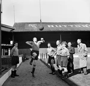 Blackpool Football Club. Left to right Allan Brown, Stan Mortensen (headering) Bill Perry Blackpool Football Club. Left to right Allan Brown, Stan Mortensen (headering) Bill Perry