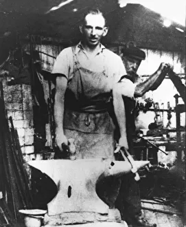 A blacksmith at work in Kings Norton, West Midlands, England A blacksmith at work in Kings Norton, West Midlands, England