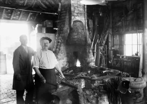 Blacksmith at work in the Old Forge, Iver. Circa 1936 Blacksmith at work in the Old Forge, Iver. Circa 1936