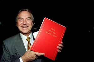 Images Dated 18th November 1997: Bob Monkhouse Comedian / TV Presenter holding the book of gags that was stolen from his