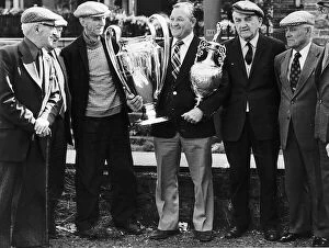 Images Dated 5th September 1977: Bob Paisley former manager of Liverpool FC Football 1977 holding football trophies