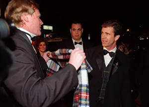 Bob Shields Daily Record journalist gives his tartan scarf to Mel Gibson after the Oscar Bob Shields Daily Record journalist gives his tartan scarf to Mel Gibson after the Oscar
