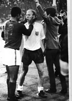 Bobby Charlton of England and Eusebio Portugal after the World Cup Semi Final in 1966 Bobby Charlton of England and Eusebio Portugal after the World Cup Semi Final in 1966