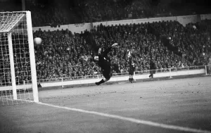 Bobby Charlton England football player 1966 Scores goal against goalkeeper Ignacio Bobby Charlton England football player 1966 Scores goal against goalkeeper Ignacio