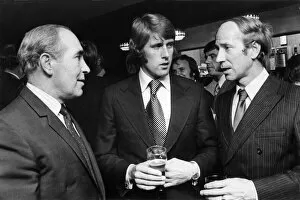 Bobby Charlton (right) talks with Geoff Hurst (centre) and Sit Alf Ramsay (left