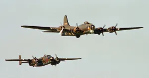 A Boeing B17 Flying Fortress (The Sally B) seen here flying in formation with a North A Boeing B17 Flying Fortress (The Sally B) seen here flying in formation with a North