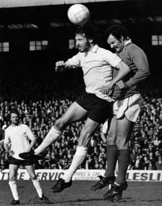 Bolton centre forward Roy Greaves and Rochdale centre half Arthur Marsh in a heading duel Bolton centre forward Roy Greaves and Rochdale centre half Arthur Marsh in a heading duel