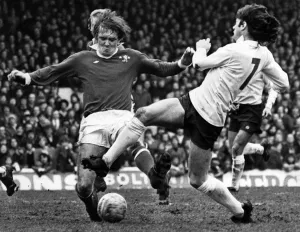 Bolton v Chelsea. Willie Morgan and David Hay go for the ball Bolton v Chelsea. Willie Morgan and David Hay go for the ball
