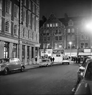 Images Dated 27th January 1975: Bomb explodes in High St. Kensington. Bomb damage at a jewellers shop in High Street