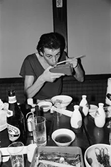 Images Dated 9th May 1980: The Boomtown Rats in Tokyo. Pictured, singer Bob Geldof eating in a Japanese restaurant