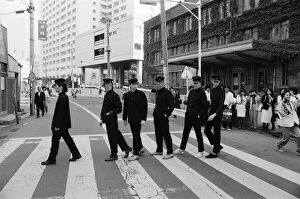 Images Dated 9th May 1980: The Boomtown Rats in Tokyo. Pictured walking across a road are the members