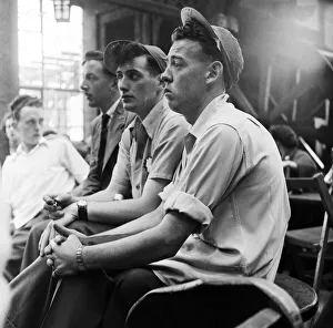 Bored boys watching a concert at Butlins Holiday Camp, Filey, North Yorkshire Bored boys watching a concert at Butlins Holiday Camp, Filey, North Yorkshire