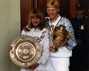 Boris Becker Tennis and Steffi Graf Tennis holding the winning trophies from Boris Becker Tennis and Steffi Graf Tennis holding the winning trophies from