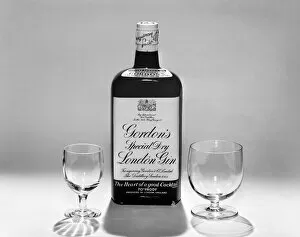 00067 Gallery: Bottles of wines and spirits with glasses. 1959 D69-009
