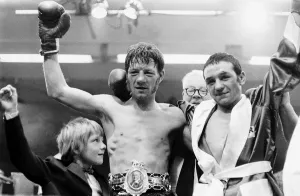 Boxing Evan Armstrong with his arm around Tommy Glenross Boxing Evan Armstrong with his arm around Tommy Glenross