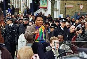 Images Dated 17th February 1999: Boxing legend Muhammad Ali (Cassius Clay) February 1999 rides through Brixton