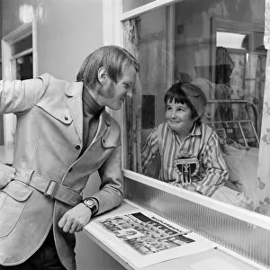A boy with typhoid meets footballer John Hickton. 1971 A boy with typhoid meets footballer John Hickton. 1971