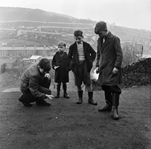 Boys of Stanleytown, South Wales, playing marbles, called locally 'allies' Boys of Stanleytown, South Wales, playing marbles, called locally 'allies'