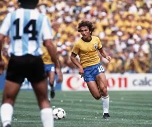 Images Dated 2nd July 1982: Brazil World Cup 1982 football Argentina v Brazil Zico on the ball as Jorge Olguin