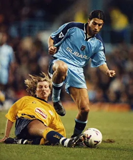 Breaking away: Youssef Chippo is challenged by Robbie Savage Breaking away: Youssef Chippo is challenged by Robbie Savage