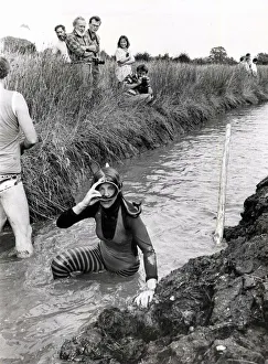 Up for a breather.... a bog snorkeller prepares to tackle the rest of the course Up for a breather.... a bog snorkeller prepares to tackle the rest of the course