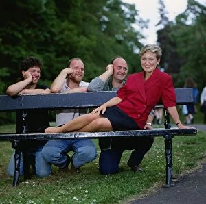 Images Dated 1st July 1989: Brenda Paterson TV presenter July 1989 sitting on a park bench with three men