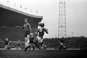 Brian Kidd of Manchester United in an aerial challenge for the ball with an Ipswich Town Brian Kidd of Manchester United in an aerial challenge for the ball with an Ipswich Town