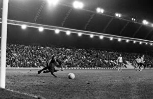 Images Dated 20th August 1971: Brian Kidd scores for Manchester United past Bob Wilson of Arsenal at Anfield