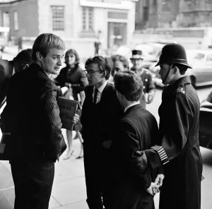 For a brief moment outside the Dorchester Hotel six students from Queen Mary' For a brief moment outside the Dorchester Hotel six students from Queen Mary'