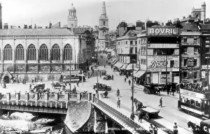 Bristol Bridge, showing trams, shops, advertising signs and St Peter's Church Bristol Bridge, showing trams, shops, advertising signs and St Peter's Church