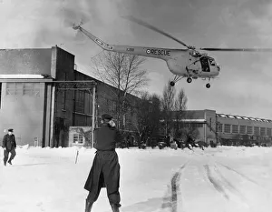 A Bristol Sycamore HR14 helicopter and crew of 275 Search and Rescue Squadron A Bristol Sycamore HR14 helicopter and crew of 275 Search and Rescue Squadron