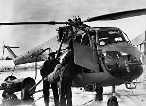 A Bristol Sycamore HR14 Search and Rescue helicopter seen here being refuelled at RAF A Bristol Sycamore HR14 Search and Rescue helicopter seen here being refuelled at RAF