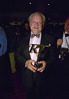 British actor David Jason at the 1998 BAFTA TV Awards with his award he received for A British actor David Jason at the 1998 BAFTA TV Awards with his award he received for A