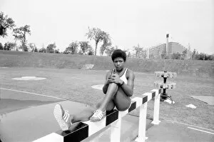 Images Dated 29th July 1976: British athlete Sonia Lannaman, sits dosconsolate at the Olympic racing track knowing she